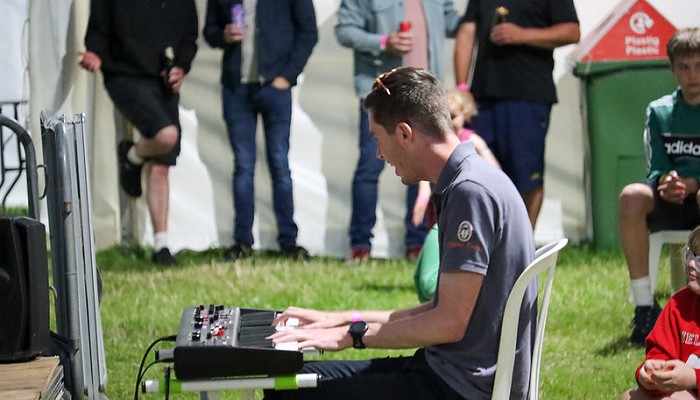 man playing a keyboard