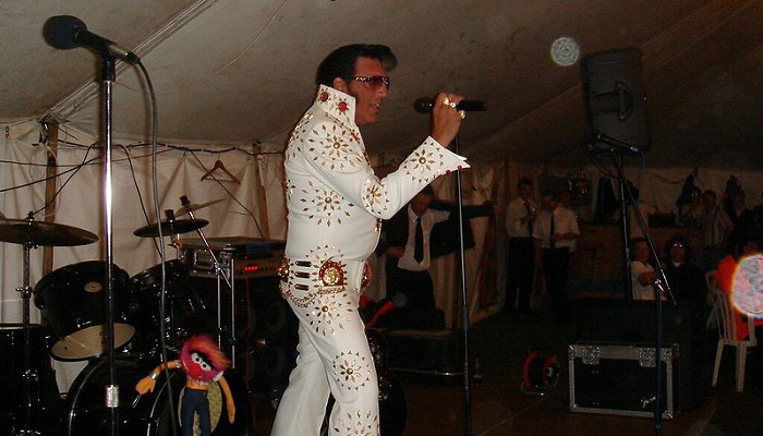 someone performing as elvis