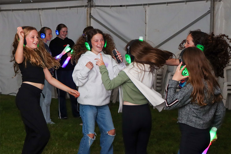 Young people dancing during the silent disco